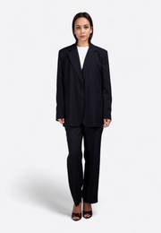 Model wearing black linen open-front blazer, East Vibe